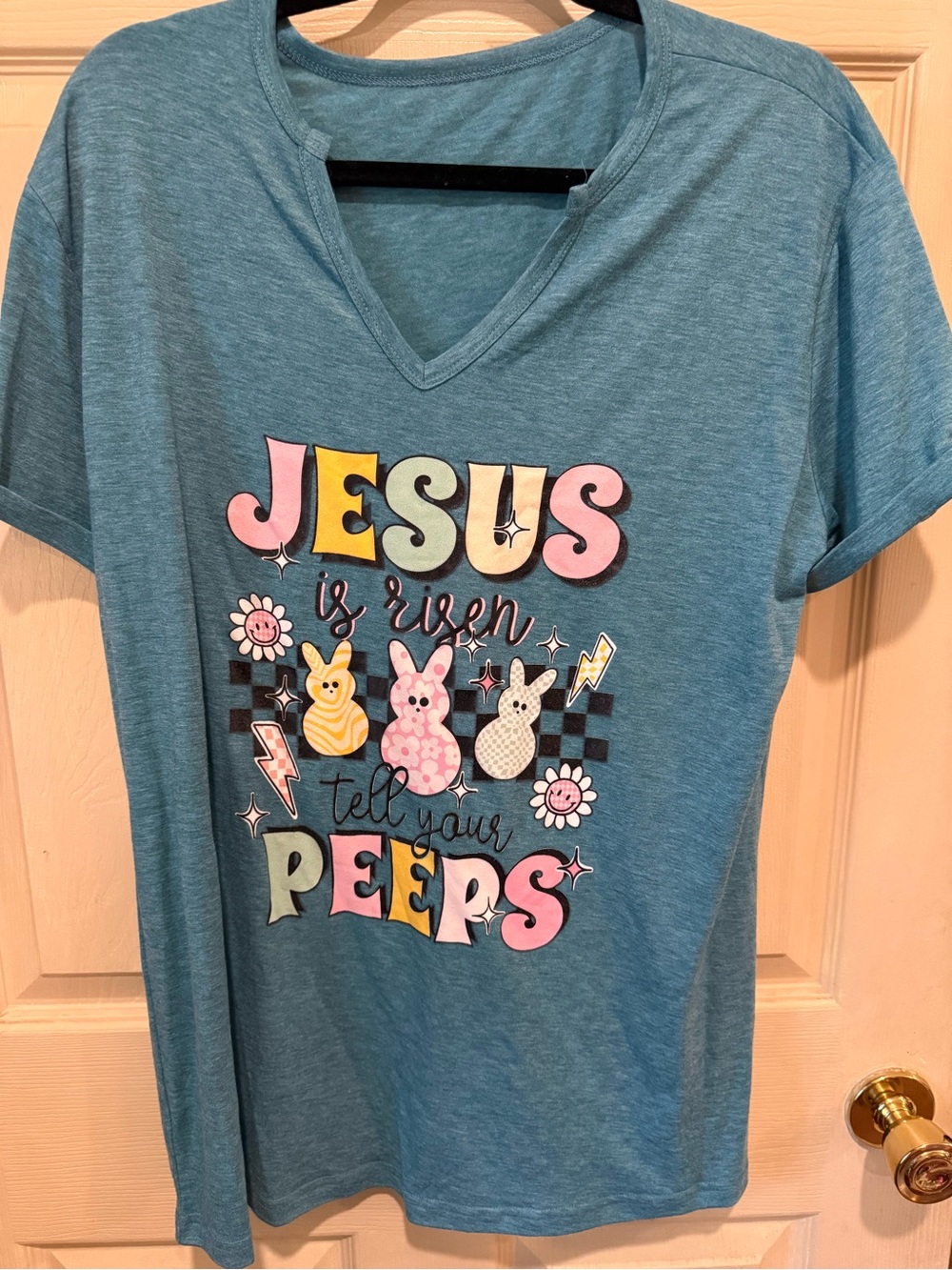 SHEIN Teal Blue “JESUS IS RISEN! TELL YOUR PEEPS!” tee